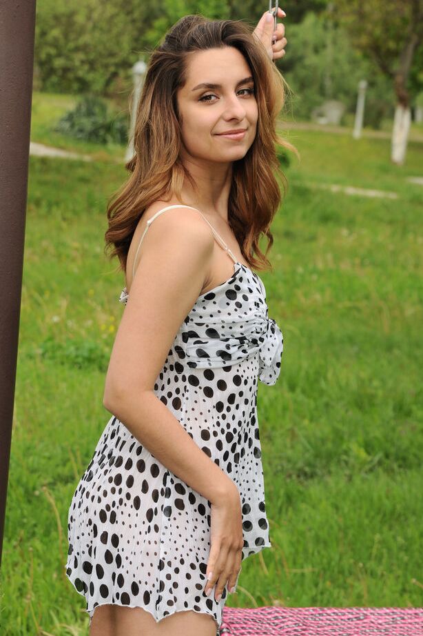 18P Sweet teen Lolli Spring gets totally naked on a swing in a backyard