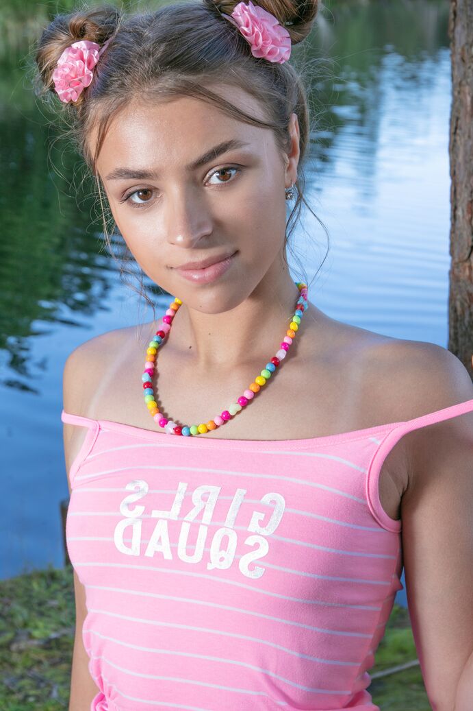 20P Charming teen Lisa gets naked in puffballs under a tree by the water