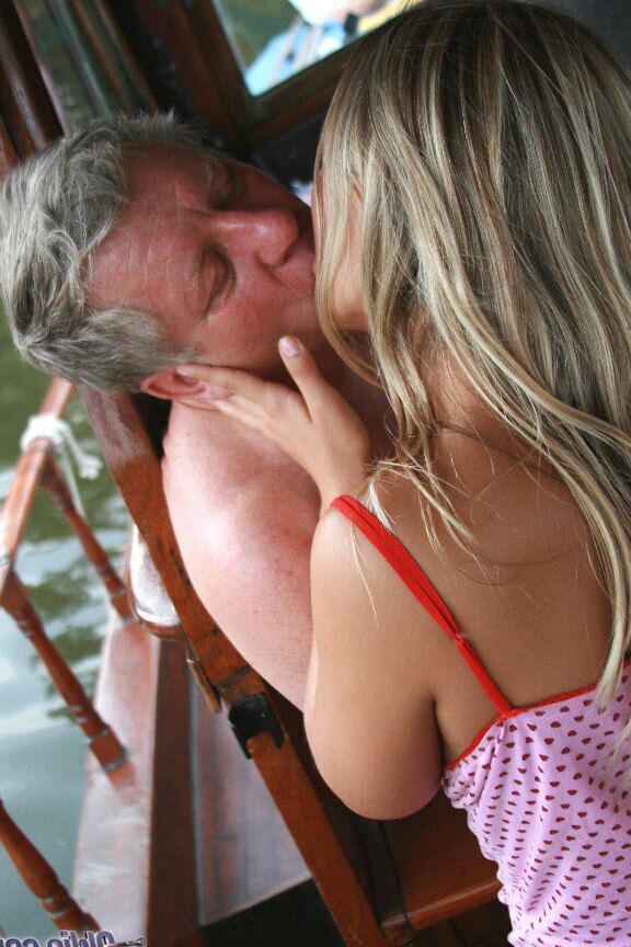21P Teen with saggy tits Mia Leone blows off an old captain on the boat