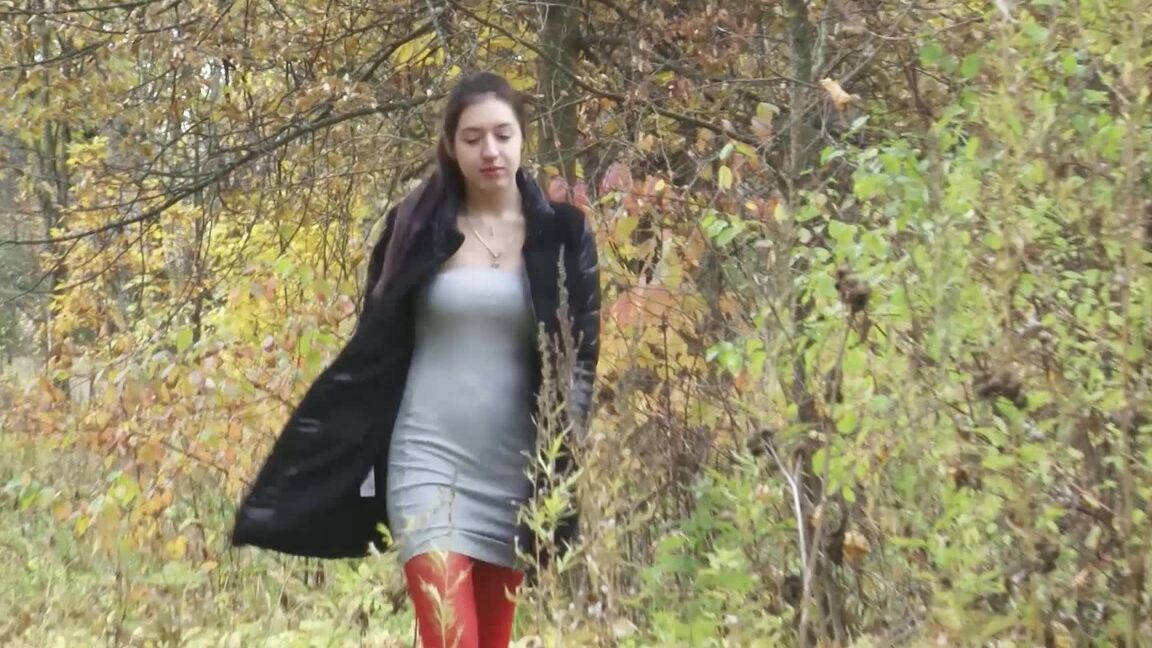 15P Pretty brunette pulls down pantyhose to pee