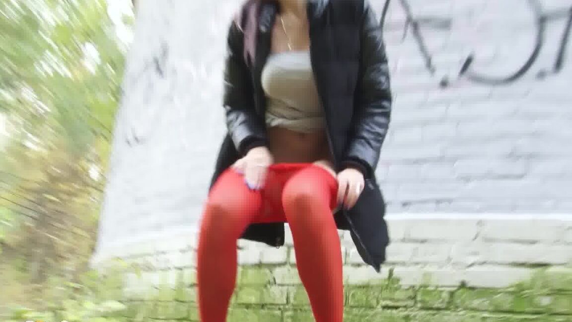 15P Pretty brunette pulls down pantyhose to pee