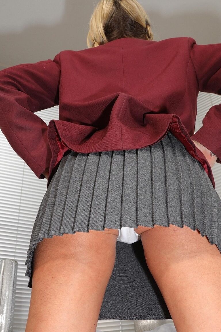 12P Stills photoset from shoot with Melanie wearing a college uniform comprising