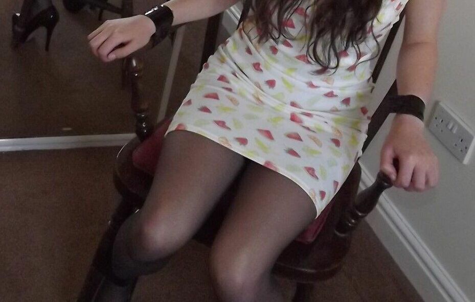 16P Clothed girl Tamara looks in a mirror while gagged and restrained to a chair