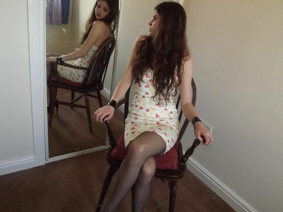 16P Clothed girl Tamara looks in a mirror while gagged and restrained to a chair