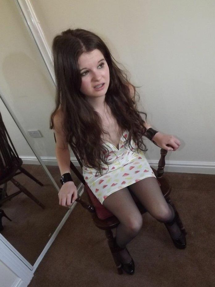 16P Clothed girl Tamara looks in a mirror while gagged and restrained to a chair