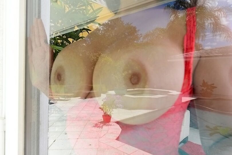 16P Smiley sweetie undressing and squeezing her big natural melons