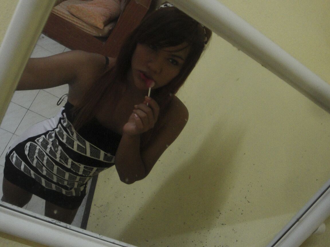 17P Teenage ladyboy likes to suck lollipop and jerk tiny cock on camera