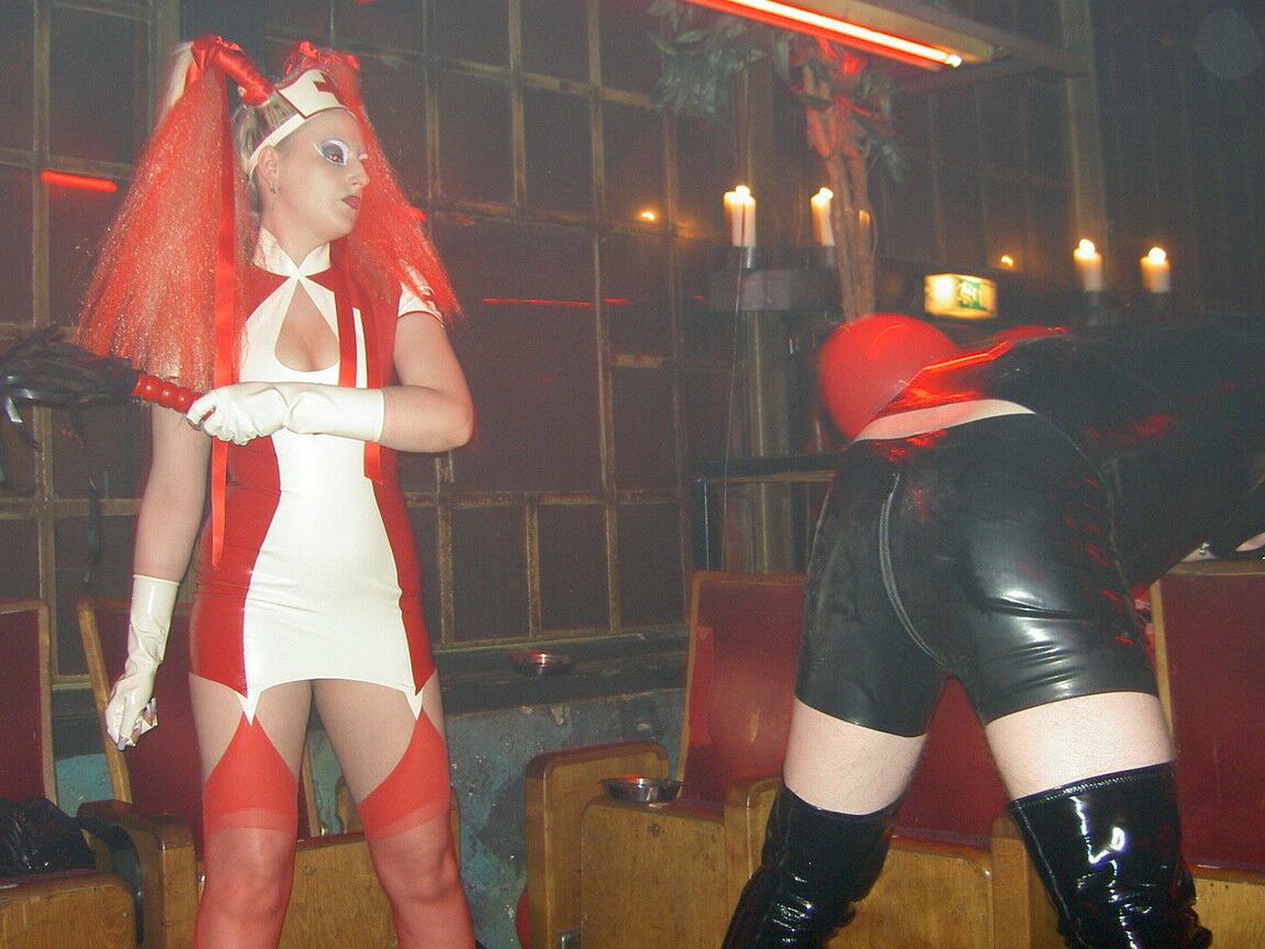 16P Latex attired chicks Darkwing Zero and Joanne Lafontaine play lezdom games