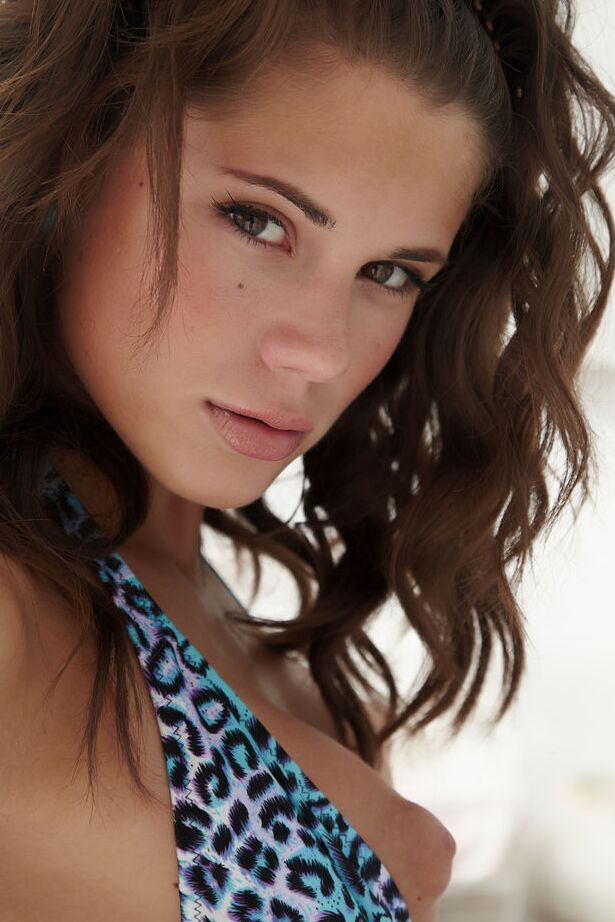 16P Erotic model Caprice likes to show off her delicious perfect body on the patio