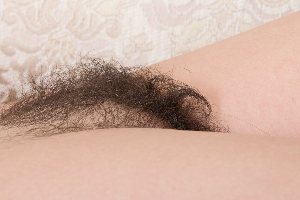 21P Curvy black haired Tayra Jane stripping to show large breasts & hairy snatch