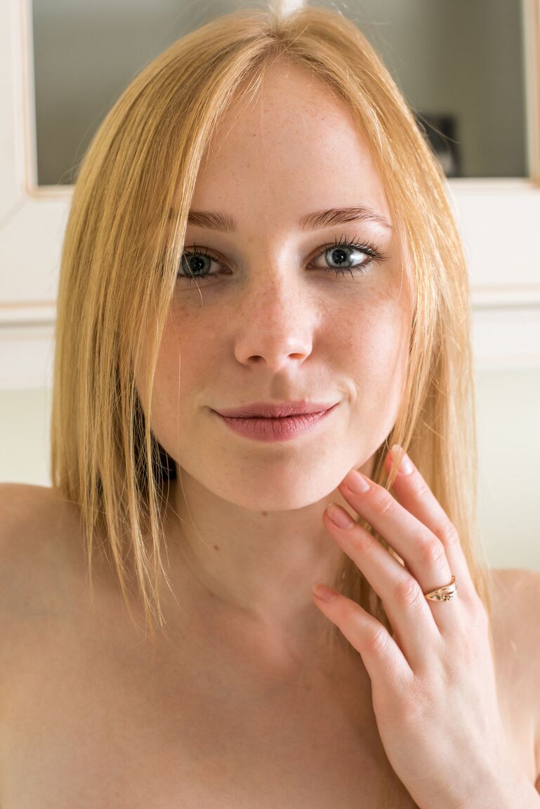 21P Tiny blonde Runa strips and poses nude while making a coffee in the kitchen