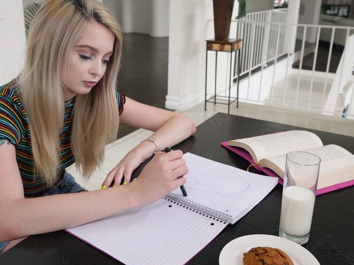 21P Little teen in jean shorts Lexi Lore feeds herself with a rod while studying