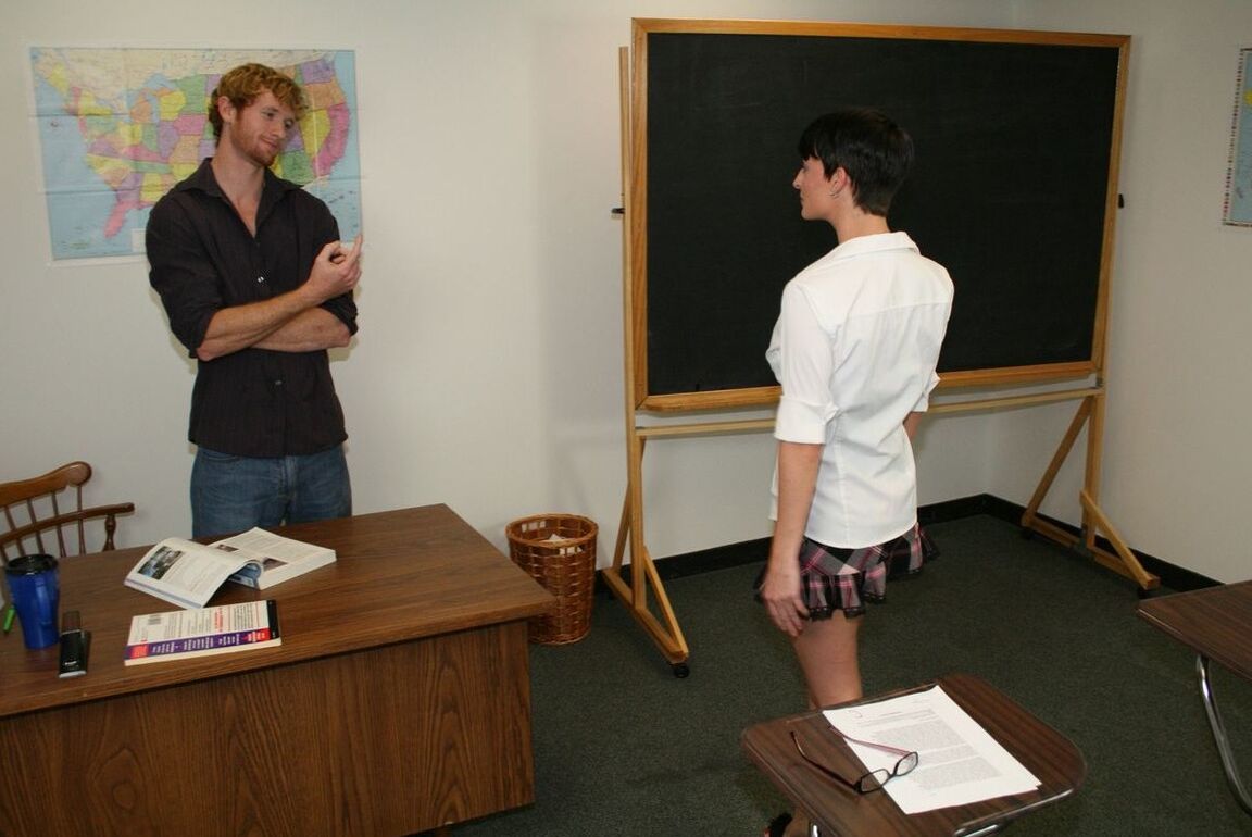 17P Short haired student Ivy Reins teases with her cleavage and gives a handjob