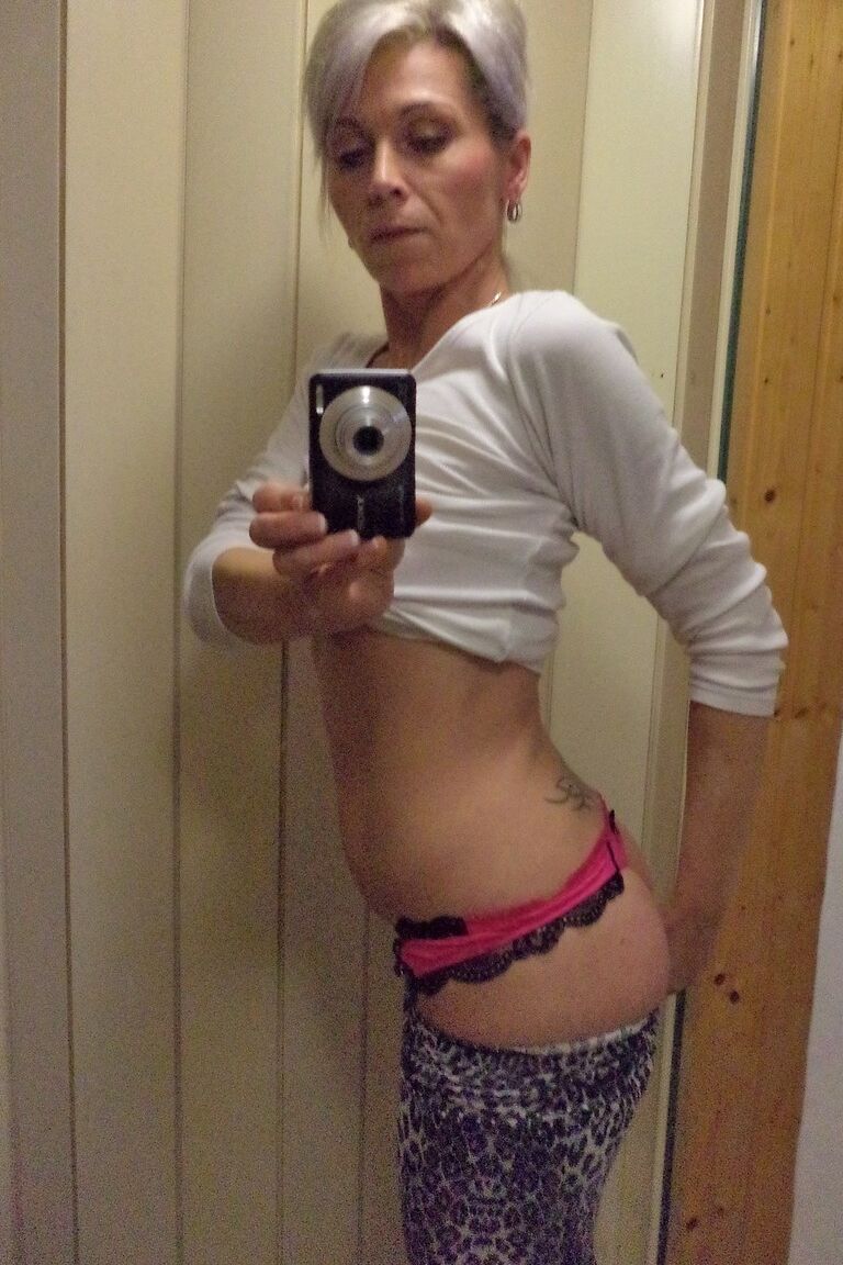 20P Czech lady Kathy White taking selfies in the mirror while stripping