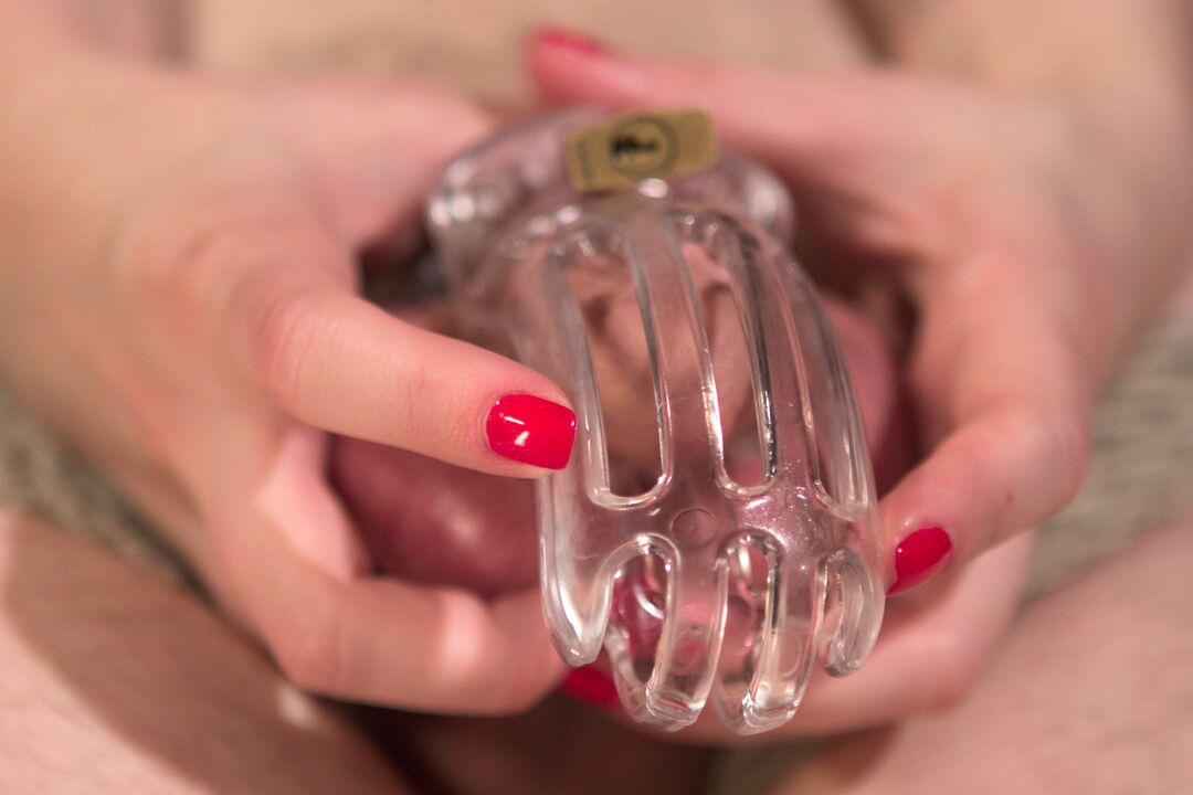 17P Femdom with big tits Aiden Starr puts a chastity device on her bound slave