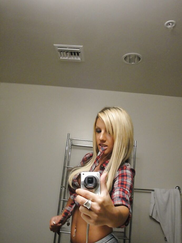 13P Perky blondie with piercing undressing and making selfies in the bath
