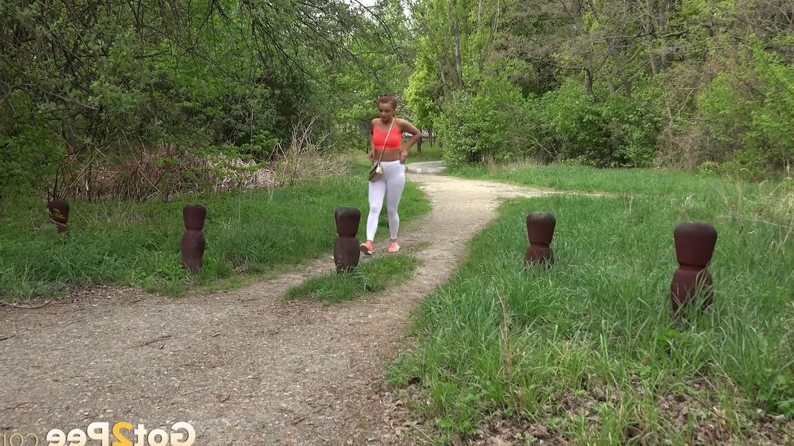 15P Redhead Dafne squats to piss on woodland path