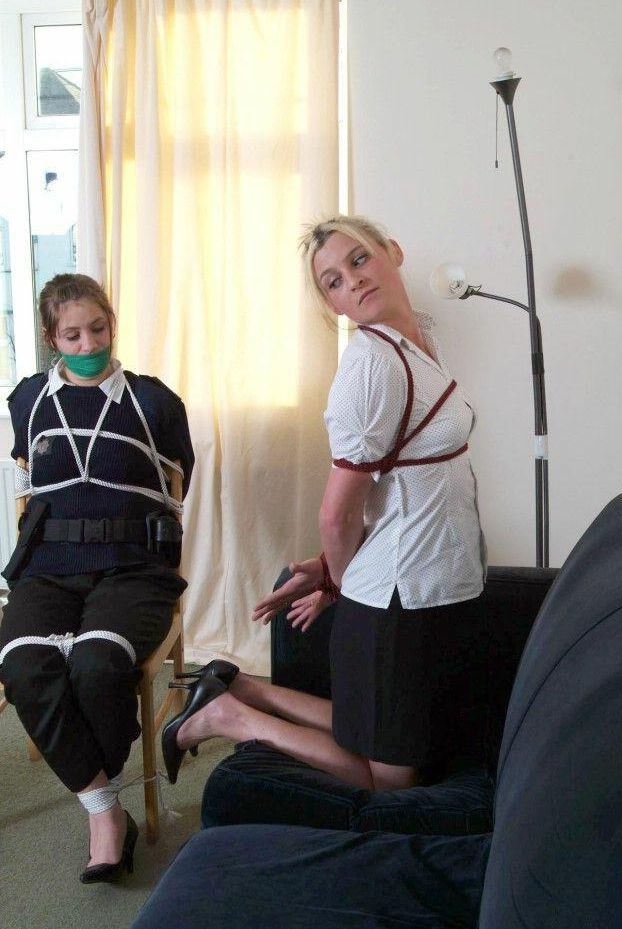 16P Restrained and gagged women take up arms after working free of bindings