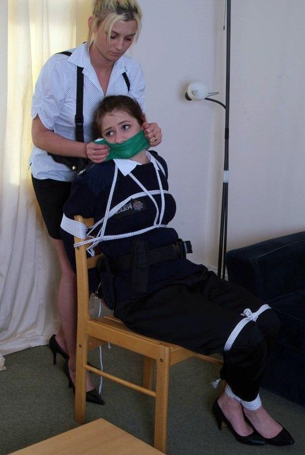 16P Restrained and gagged women take up arms after working free of bindings