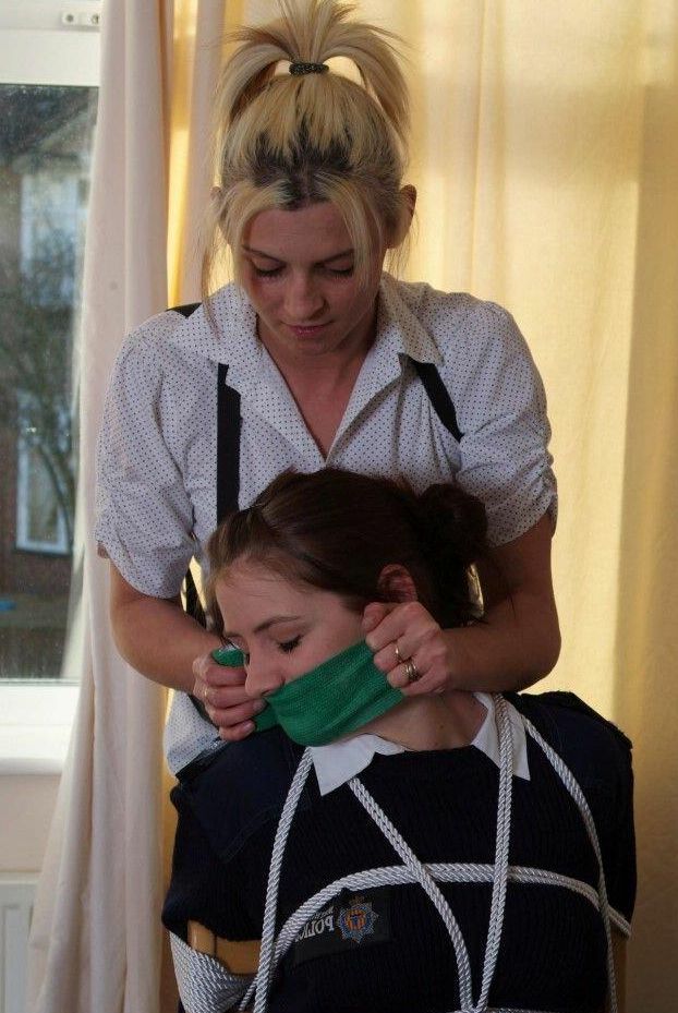 16P Restrained and gagged women take up arms after working free of bindings