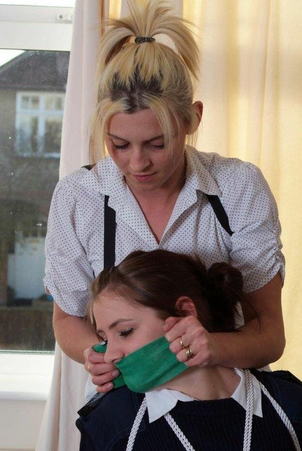 16P Restrained and gagged women take up arms after working free of bindings