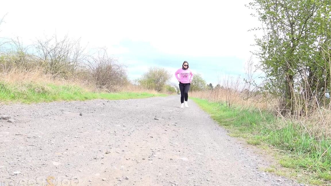 15P Barbara Bieber relieves herself on a road