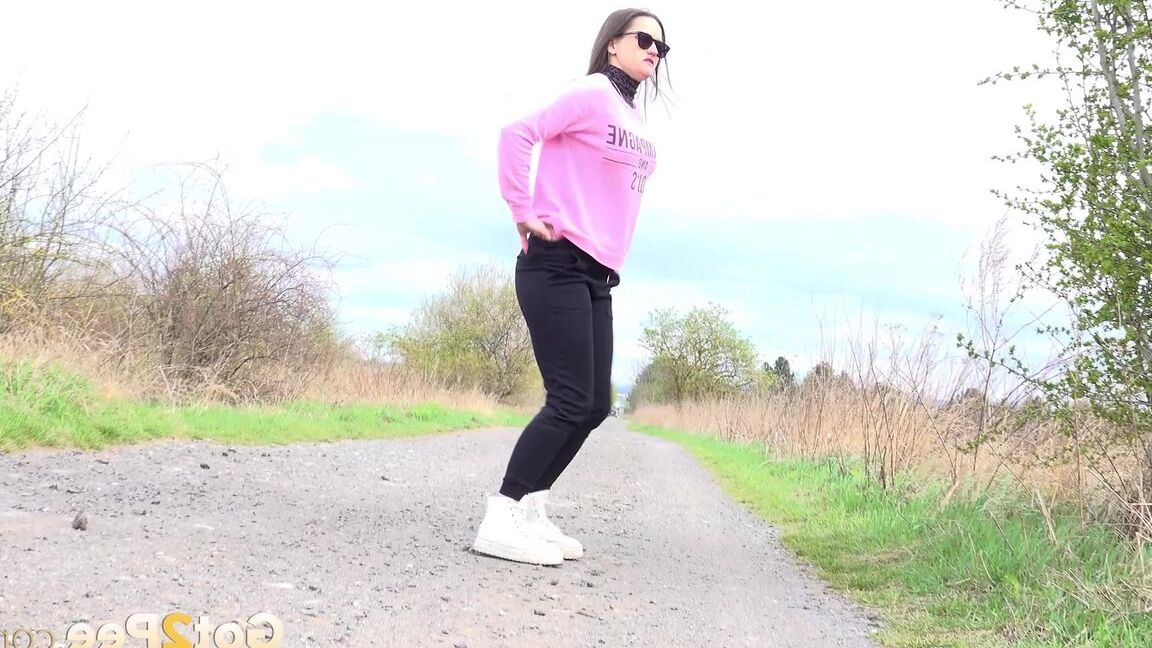 15P Barbara Bieber relieves herself on a road