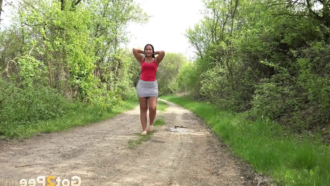 15P Lolita Black squats and pees on the ground