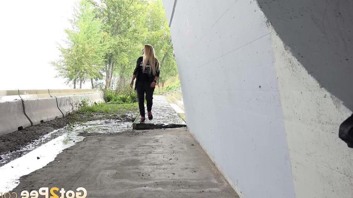 15P Gorgeous Jena Lovely pees outside on concrete