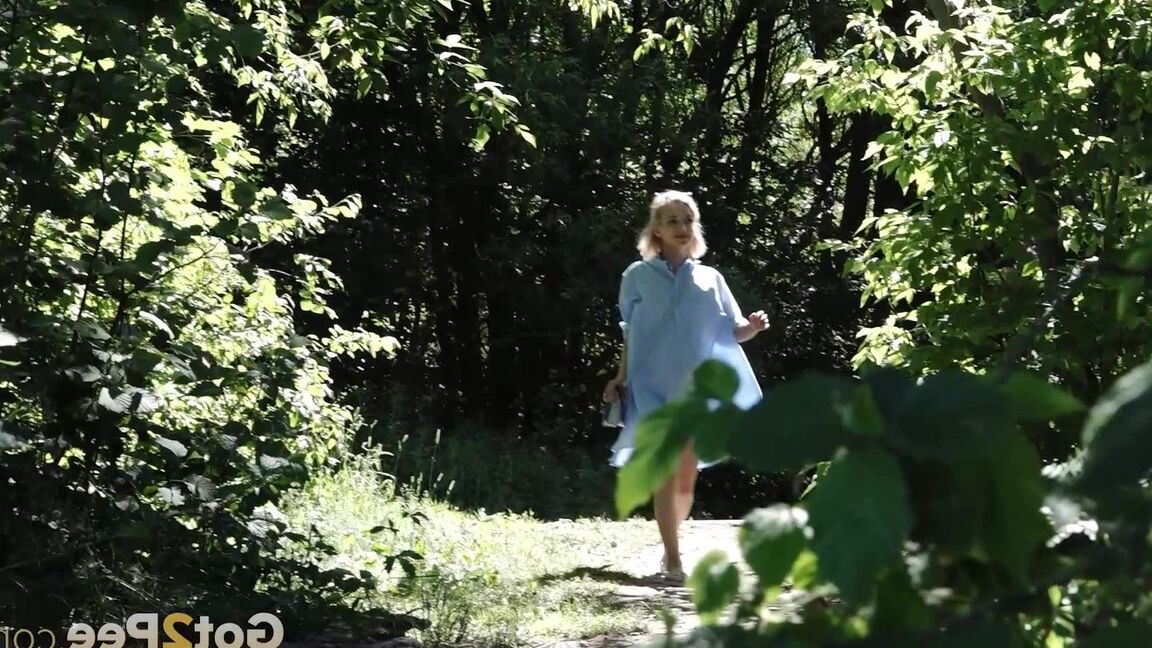 15P Petite blonde Masha squats for an urgent piss by riverside bushes