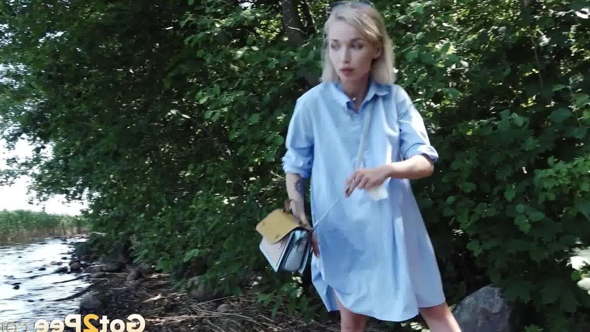 15P Petite blonde Masha squats for an urgent piss by riverside bushes