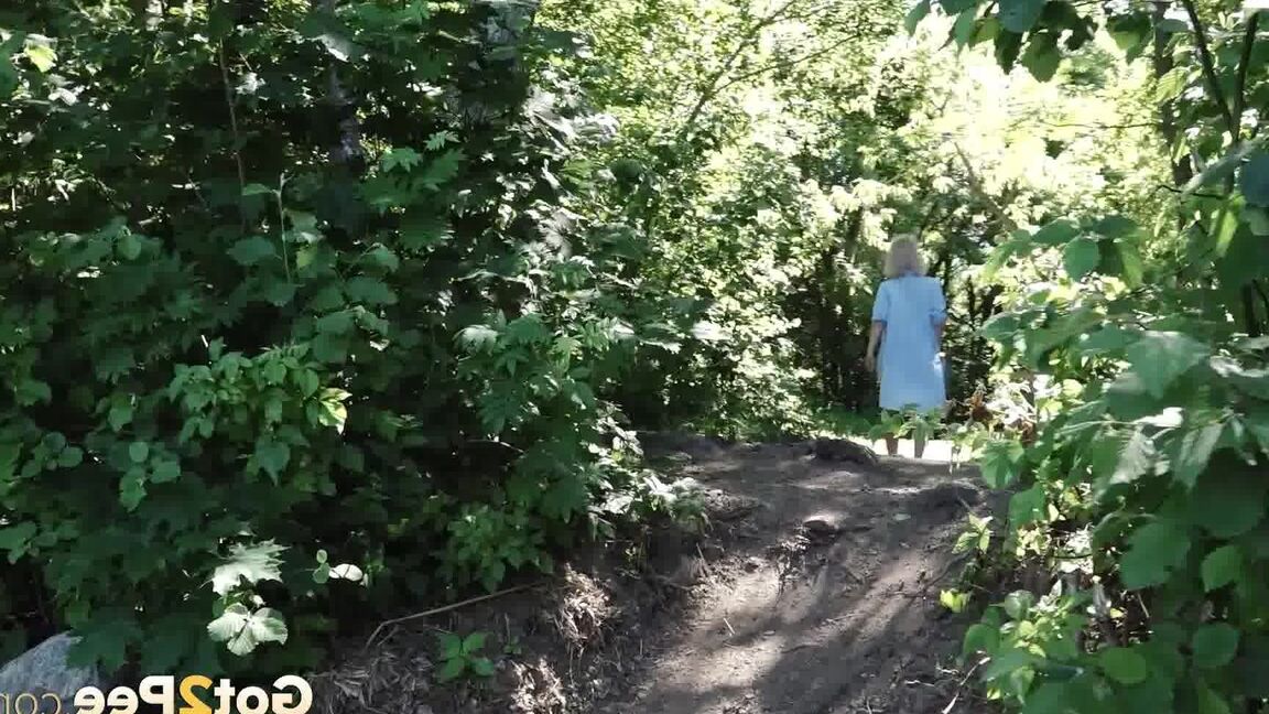 15P Petite blonde Masha squats for an urgent piss by riverside bushes