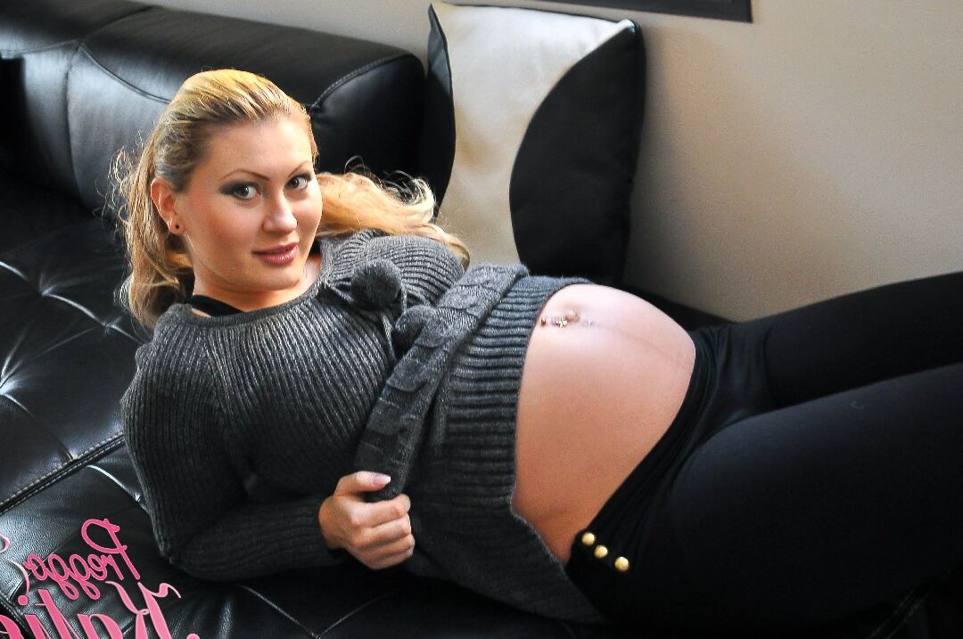 16P Preggo Katie looks glamorous and gorgeous and wears only a pair of socks in