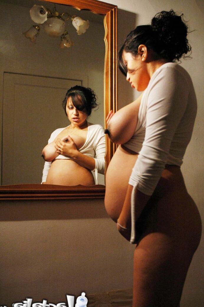 16P Talia 8 months pregnant posing in the mirror