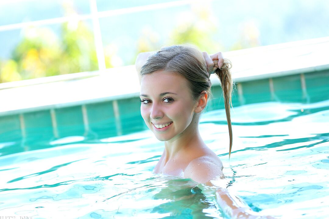 12P Sweet young cutie showing off her wet booty and small boobs in the pool