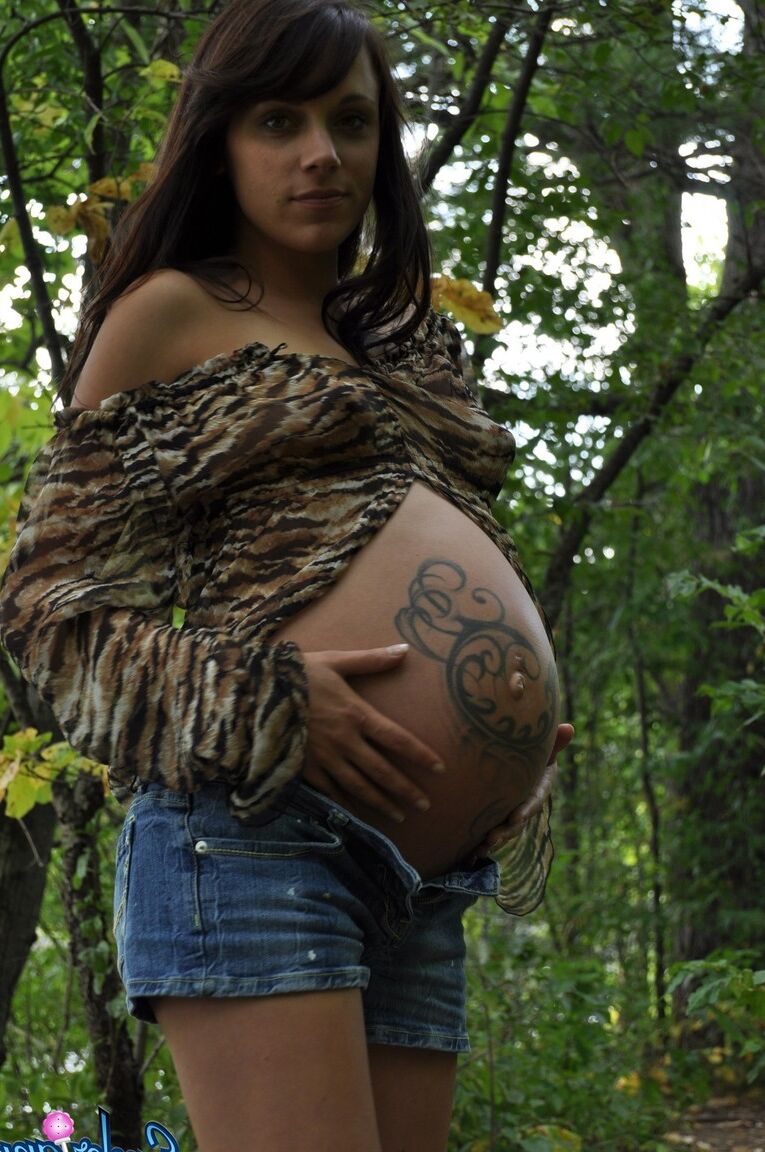 16P Pregnant amateur Brianna shows tits and twat plus swollen belly in the woods
