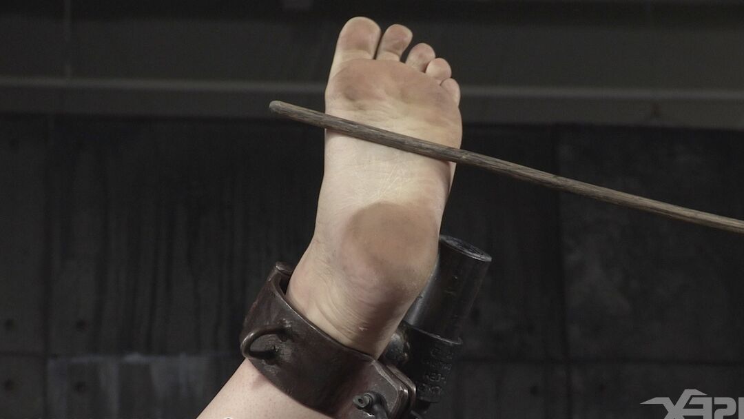 15P Restrained white girl Harley Ace is subjected to painful abuse in a dungeon