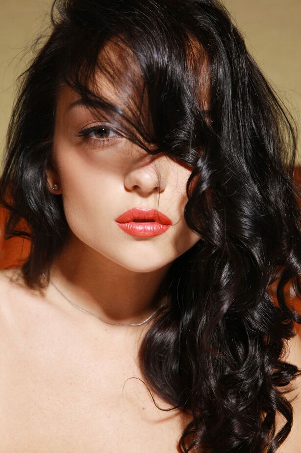 18P Gorgeous brunette Jenya D sports pierced nipples while posing nude in nylons