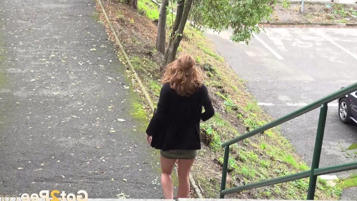 15P Natural redhead Chrissy Fox squats for a pee on a set of public steps