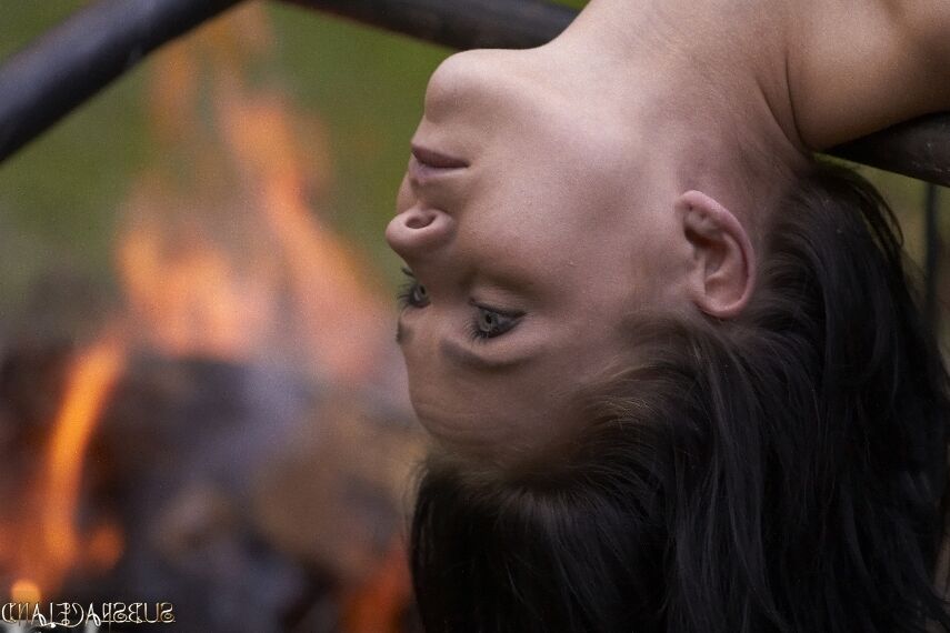 16P Helpless brunette is roasted over a fire and submerged under water