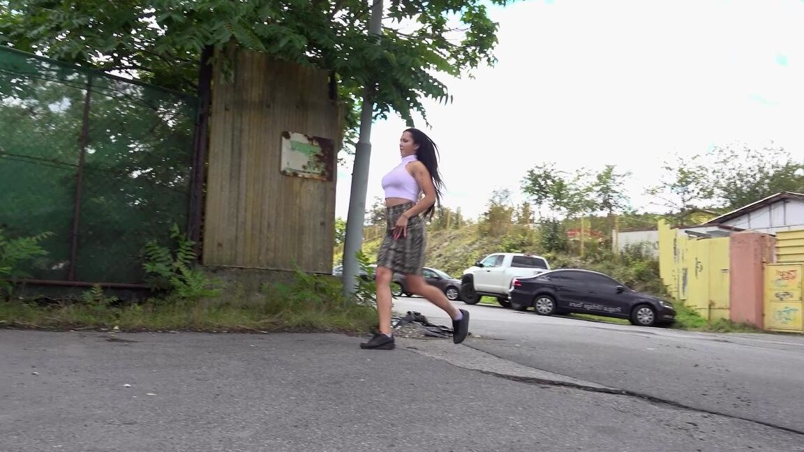 15P Distressed girl Isabel Dark takes a badly needed pee on a paved roadway