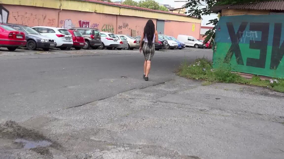 15P Distressed girl Isabel Dark takes a badly needed pee on a paved roadway