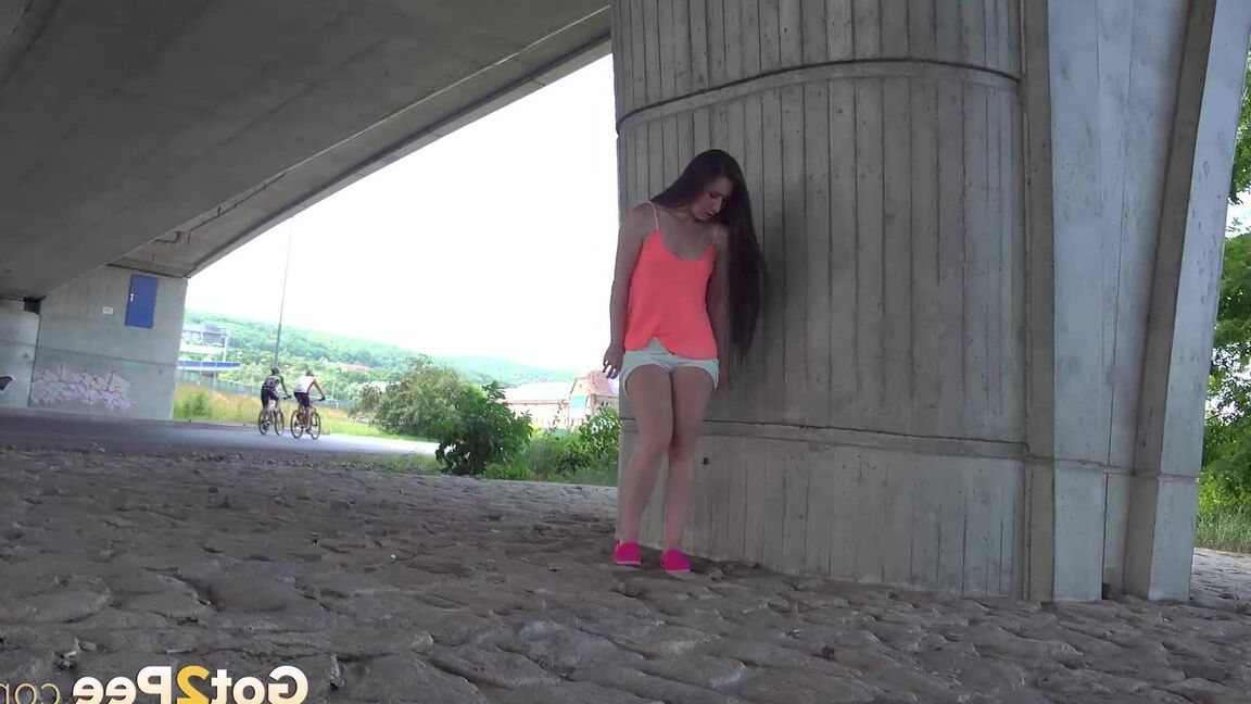 15P Lara Fox pisses in public under a bridge