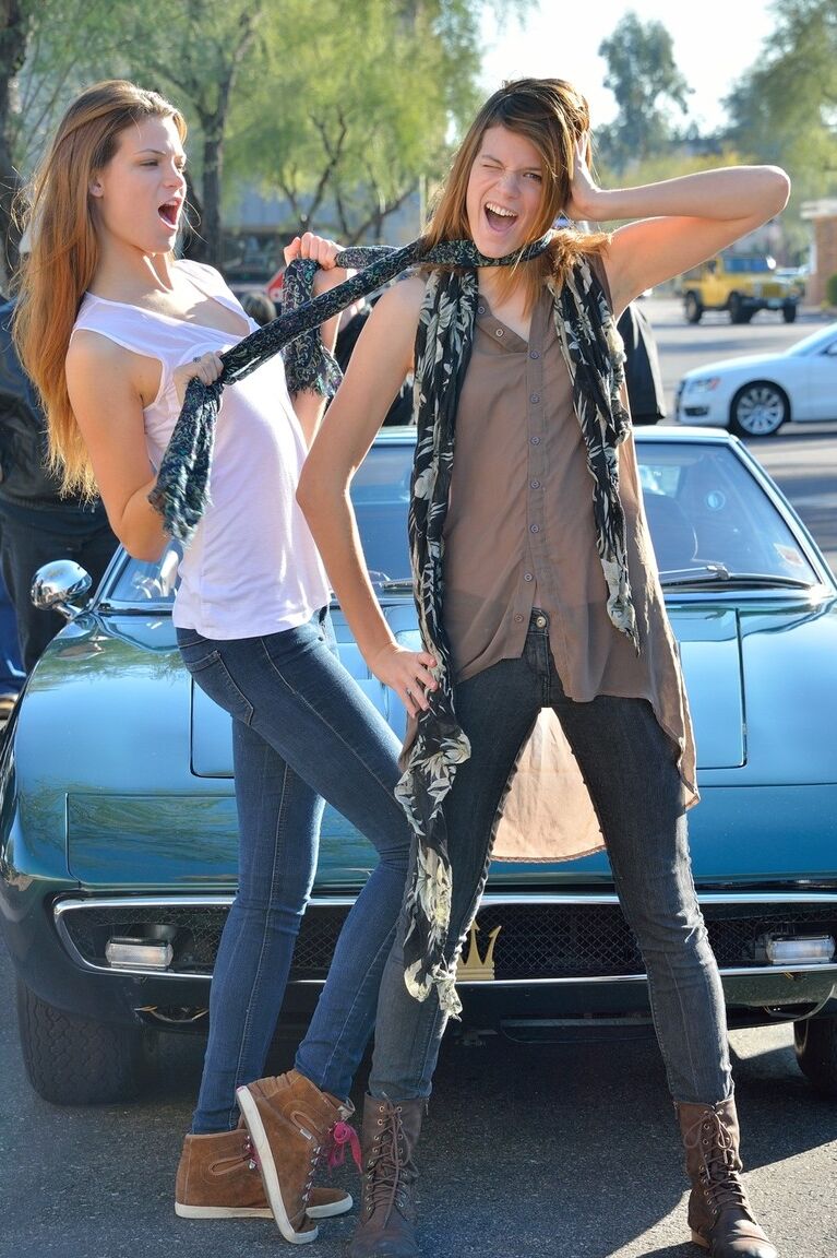 21P Two frisky teenage babes Raylene & Romi strip in public & pose nude