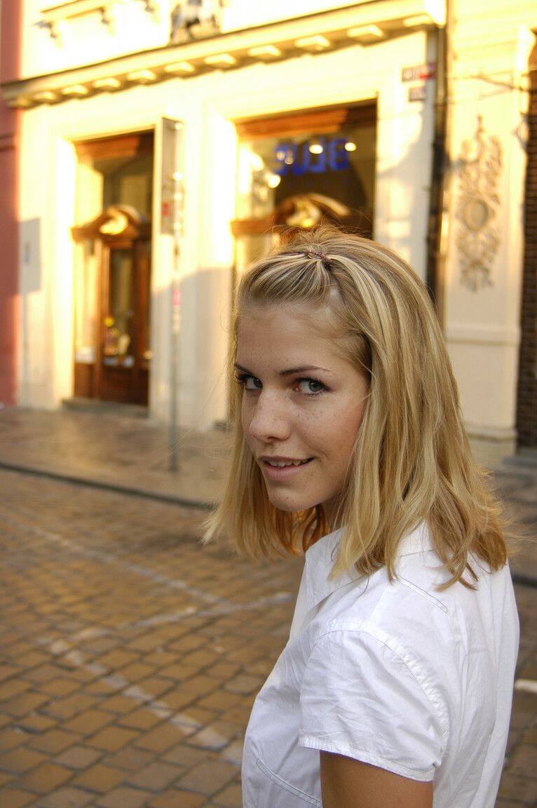 21P Blonde teen with an athletic figure Iveta B flashes her bald cunt in public