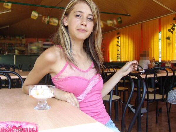 15P Charming teen flashes a no panty up skirt while eating ice cream