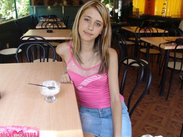 15P Charming teen flashes a no panty up skirt while eating ice cream