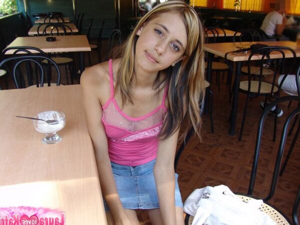 15P Charming teen flashes a no panty up skirt while eating ice cream