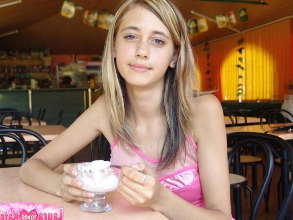 15P Charming teen flashes a no panty up skirt while eating ice cream
