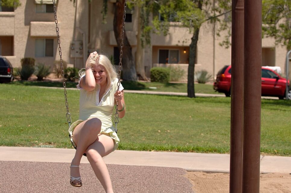 21P Amateur babe Carissa shows her small tits and flashes her twat at a playground
